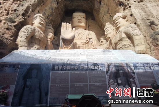 時下，中國“石窟鼻祖”天梯山石窟第13窟大佛足部與局部危巖體搶救性保護項目正在施工。圖為施工現(xiàn)場。陳曉斌 攝