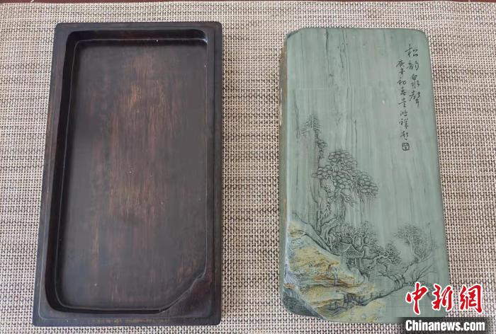 圖為盧保勝為提升洮硯文化內(nèi)涵，制作“一硯一銘、一盒一拓”成品展示?！堟?攝